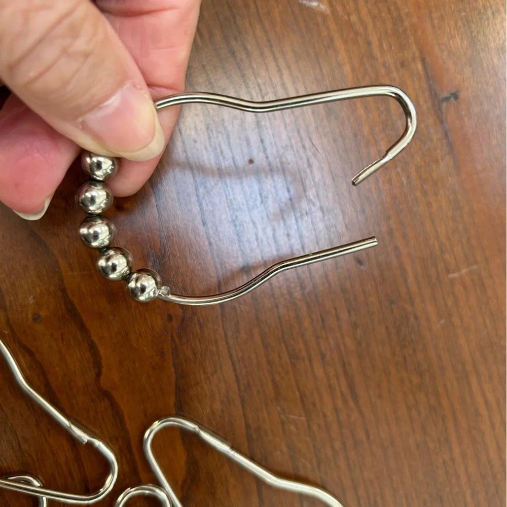 StainlessSteel Shower Curtain Hooks w/rolling Beads enables easy gliding. Set/12